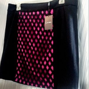 Black & pink fishnet style skirt new with tags
